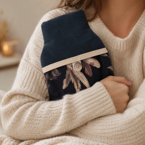 model holding hermes hot water bottle