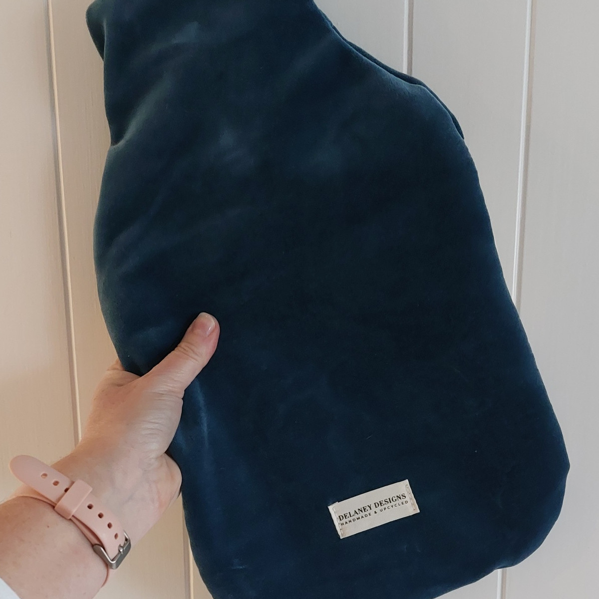 Back view blue hot water bottle